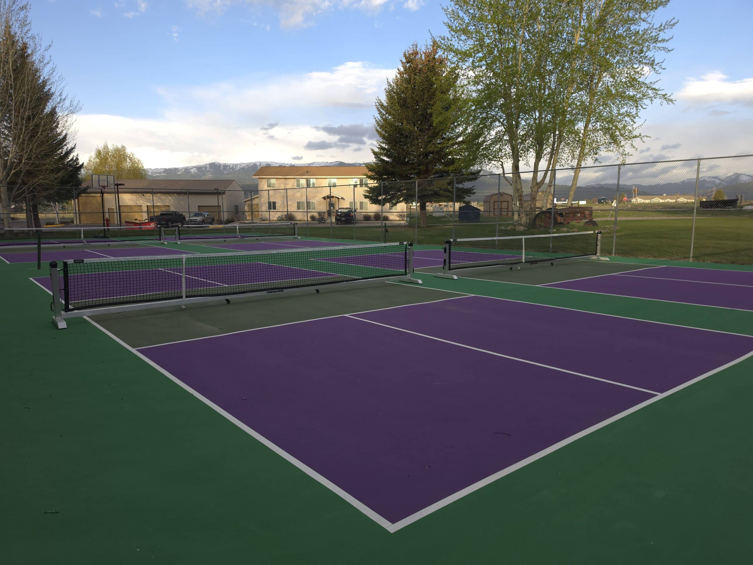 New pickleball courts at Flying Saddle Resort in Alpine, Wyoming with mountain views